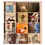 Collection of 12 Music CDs Featuring Various Artists including Luther Vandross and Paula Abdul