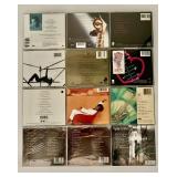 Collection of 12 Music CDs Featuring Various Artists including Luther Vandross and Paula Abdul