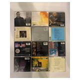 Collection of 12 Music CDs Featuring Various Artists including Mick Jones