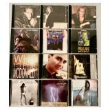 Collection of 12 Music CDs Including Michael Bolton and Barry Manilow