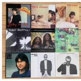 Assorted Collection of 9 Vinyl Records Featuring Bruce Springsteen, Mick Jagger, Eric Martin, and More