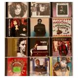 Collection of 12 Music CDs Featuring Various Artists including Janet Jackson and Elvis Presley