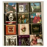 Collection of 12 Classic Music CDs Including REO Speedwagon and The Monkees