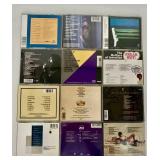 Collection of 12 Classic Music CDs Including REO Speedwagon and The Monkees