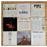 Collection of 9 Vintage Vinyl Records including Frank Sinatra and Johnny Mathis