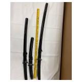 Three-Piece Japanese Sword Set with Intricate Guard Designs