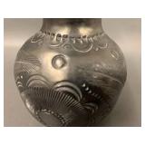 Handcrafted Black Pottery Vase with Intricate Design