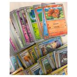 Pokemon Trading Cards w/ Holographics & Some Sleeves