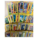 Collection of 200 Pokemon Trading Cards with Rare Holographic and Sleeves
