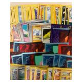 Large Mixed Lot of 200 Pokmon Trading Cards with Sleeved Cards