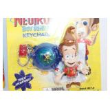 Collection of 4 Nostalgic Toy Keychains and Gadgets