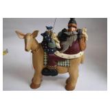 Folk Art Santa Claus Riding a Mule Figurine