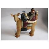 Folk Art Santa Claus Riding a Mule Figurine