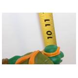 1990s Teenage Mutant Ninja Turtles Michelangelo Figure on Interactive Base