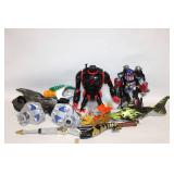 Collection of Action Figures, Toy Vehicles, and Accessories