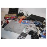 Vintage Gaming Collection with Sony PlayStation, Nintendo 64, and Sega Genesis Consoles