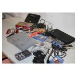 Vintage Gaming Collection with Sony PlayStation, Nintendo 64, and Sega Genesis Consoles