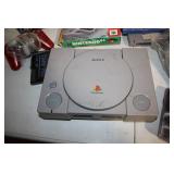 Vintage Gaming Collection with Sony PlayStation, Nintendo 64, and Sega Genesis Consoles