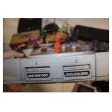 Vintage Gaming Collection with Sony PlayStation, Nintendo 64, and Sega Genesis Consoles