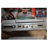 Vintage Gaming Collection with Sony PlayStation, Nintendo 64, and Sega Genesis Consoles