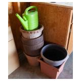 Large plastic planters and watering can