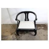 Elegant Black Armchair with Cream Cushion