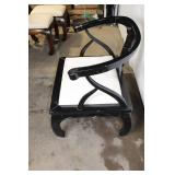 Elegant Black Armchair with Cream Cushion