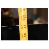 Elegant Black Armchair with Cream Cushion