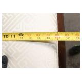 Elegant Dark Wood Footstool Ottoman with Geometric Upholstery