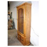 Rustic Oak Display Gun Cabinet with Glass Door and Deer Accents
