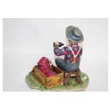 Vintage Porcelain Figurine of Boy Feeding Puppy