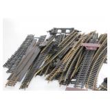 Collection of Vintage Model Train Cars and Accessories