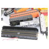 Collection of Vintage Model Train Cars and Accessories