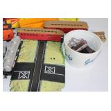 Collection of Vintage Model Train Cars and Accessories