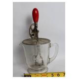 Vintage Glass Hand Mixer with Red Handle and Measuring Cup