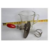 Vintage Glass Hand Mixer with Red Handle and Measuring Cup