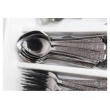 Set of Vintage Stainless Steel Flatware with Floral Design and Openers