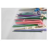 Assortment of Knitting Needles and Row Counter