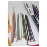 Assortment of Knitting Needles and Row Counter
