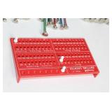 Assortment of Knitting Needles and Row Counter