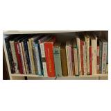 Collection of Cookbooks and White Shelf