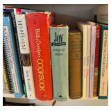 Collection of Cookbooks and White Shelf