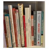 Collection of Cookbooks and White Shelf