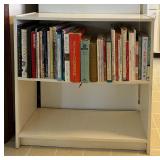 Collection of Cookbooks and White Shelf