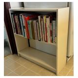 Collection of Cookbooks and White Shelf