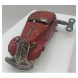 Vintage J. Chein & Co Tin Monkey Bank and Schuco Wind-Up Car Toy