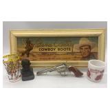 Gene Autry Cowboy Boots Sign with Vintage Davy Crockett Glass, Hopalong Cassidy Mug, and Toy Gun