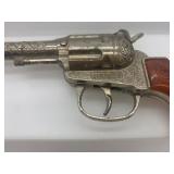 Gene Autry Cowboy Boots Sign with Vintage Davy Crockett Glass, Hopalong Cassidy Mug, and Toy Gun