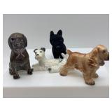 Â Set of 8 Ceramic Dog Figurines