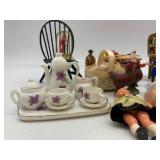 Collection of Vintage Miniature Dolls and Toy Tea Set with Floral Design